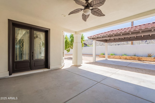 2701 E Caldwell St, Phoenix, AZ 85042 - view of patio / terrace with french doors, fence, and a ceiling fan