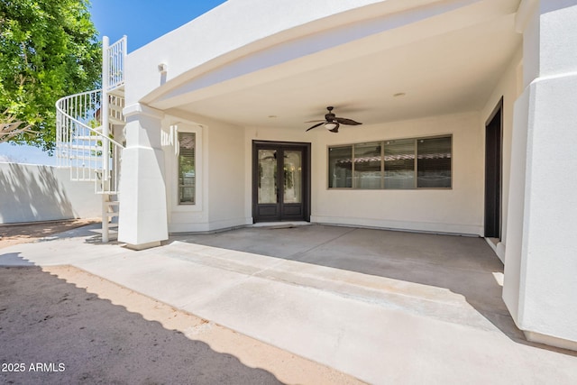 2701 E Caldwell St, Phoenix, AZ 85042 - view of patio featuring stairway, a ceiling fan, and french doors