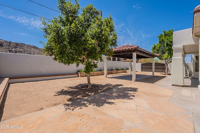 2701 E Caldwell St, Phoenix, AZ 85042 - view of patio featuring a fenced backyard and a gazebo