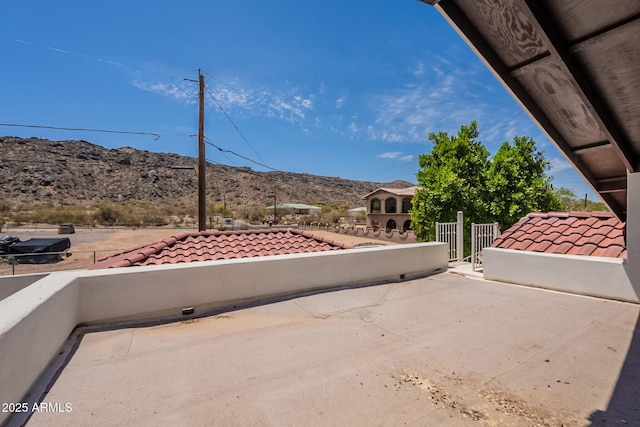 2701 E Caldwell St, Phoenix, AZ 85042 - view of patio featuring fence and a mountain view