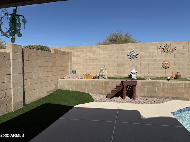 view of patio / terrace with a fenced backyard