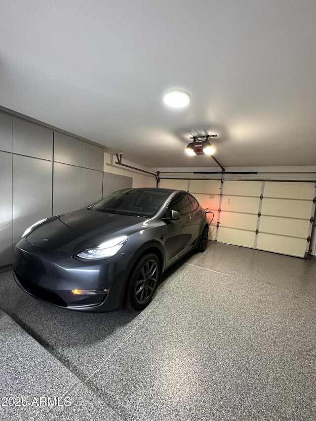 garage featuring a garage door opener