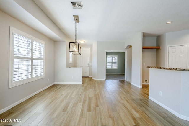 6317 S Kimberlee Way, Chandler, AZ 85249 - unfurnished dining area featuring light wood-type flooring, baseboards, and recessed lighting