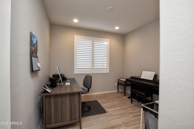 26421 W Zachary Dr, Buckeye, AZ 85396 - office area with baseboards, wood tiled floor, and recessed lighting