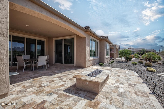 26421 W Zachary Dr, Buckeye, AZ 85396 - view of patio featuring an outdoor fire pit