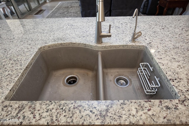 26421 W Zachary Dr, Buckeye, AZ 85396 - interior details with a sink and light stone counters