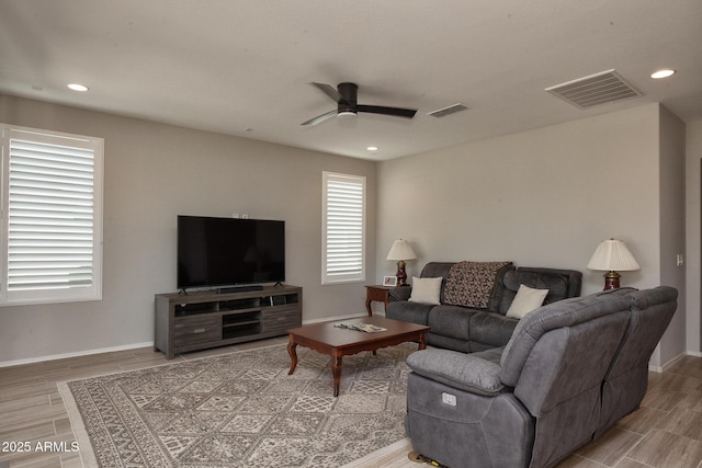 26421 W Zachary Dr, Buckeye, AZ 85396 - living area featuring visible vents, recessed lighting, a ceiling fan, and wood finished floors