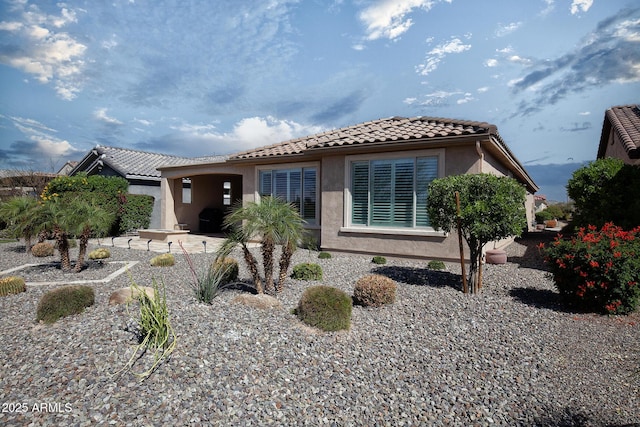 26421 W Zachary Dr, Buckeye, AZ 85396 - view of front of home featuring a tiled roof and stucco siding