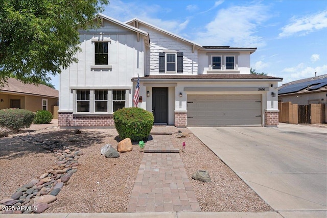 2466 E Harrison Ct, Gilbert, AZ 85295 - view of front of house with brick siding, driveway, and an attached garage
