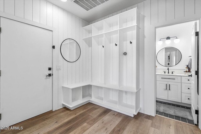 2466 E Harrison Ct, Gilbert, AZ 85295 - mudroom with wood finished floors and a sink