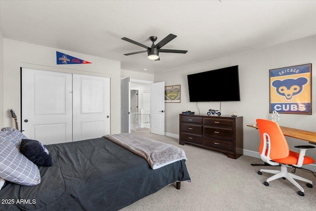 2466 E Harrison Ct, Gilbert, AZ 85295 - bedroom with baseboards, light carpet, a closet, and ceiling fan