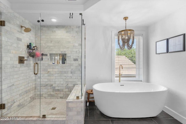 2466 E Harrison Ct, Gilbert, AZ 85295 - full bath with a freestanding tub, tile patterned floors, a stall shower, a chandelier, and baseboards