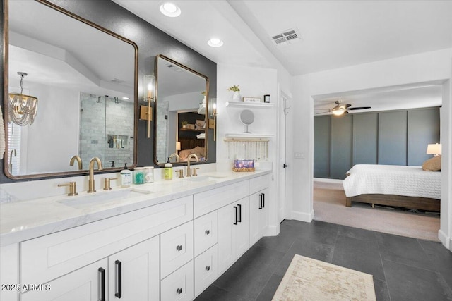 2466 E Harrison Ct, Gilbert, AZ 85295 - ensuite bathroom featuring double vanity, a ceiling fan, a stall shower, tile patterned flooring, and a chandelier