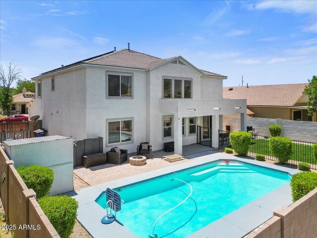 2466 E Harrison Ct, Gilbert, AZ 85295 - rear view of property with a patio area, stucco siding, an outdoor living space with a fire pit, and a tiled roof