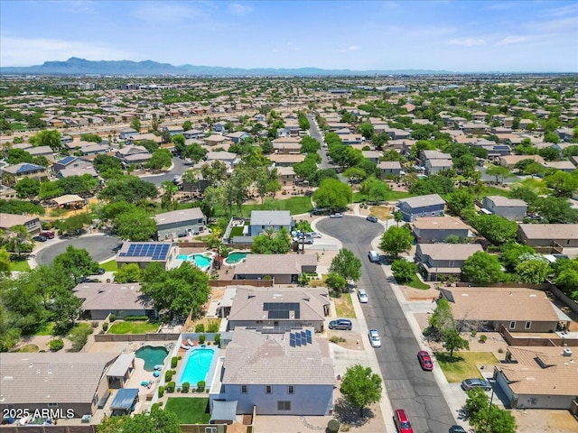 2466 E Harrison Ct, Gilbert, AZ 85295 - aerial view of residential area featuring a pool and mountains