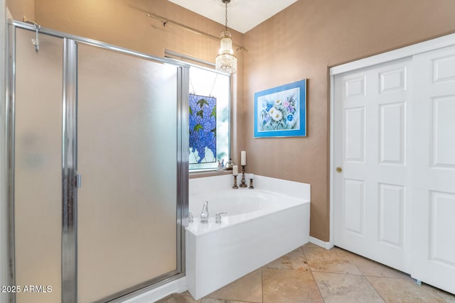 42423 N Acadia Way, Anthem, AZ 85086 - bathroom with a stall shower, a garden tub, and tile patterned floors