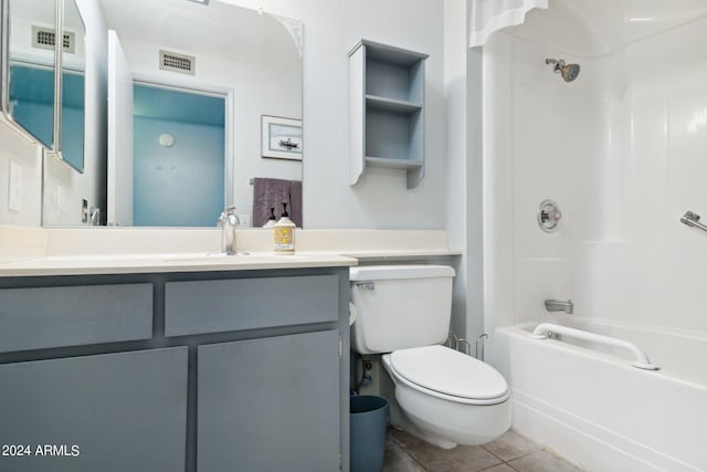 full bathroom featuring vanity, shower / bath combination, tile patterned flooring, and toilet