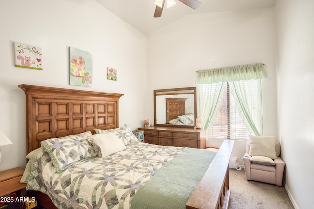 carpeted bedroom featuring a ceiling fan and high vaulted ceiling