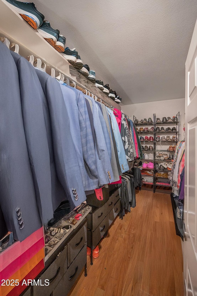 5102 N 31st Pl Unit 432, Phoenix, AZ 85016 - spacious closet with wood finished floors