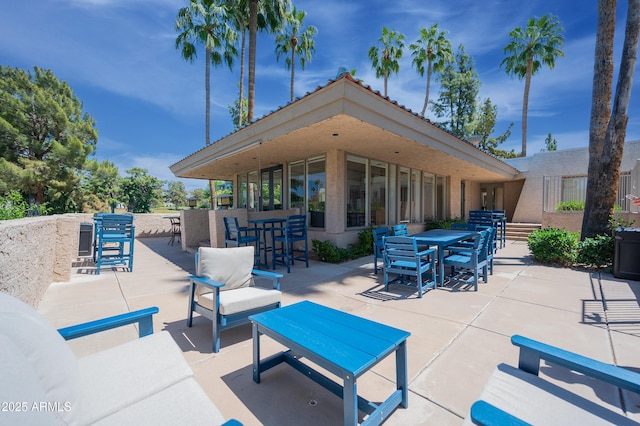 5102 N 31st Pl Unit 432, Phoenix, AZ 85016 - view of patio / terrace with outdoor dining space and outdoor dry bar
