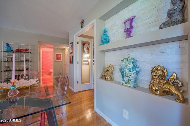 5102 N 31st Pl Unit 432, Phoenix, AZ 85016 - hallway with wood finished floors and baseboards