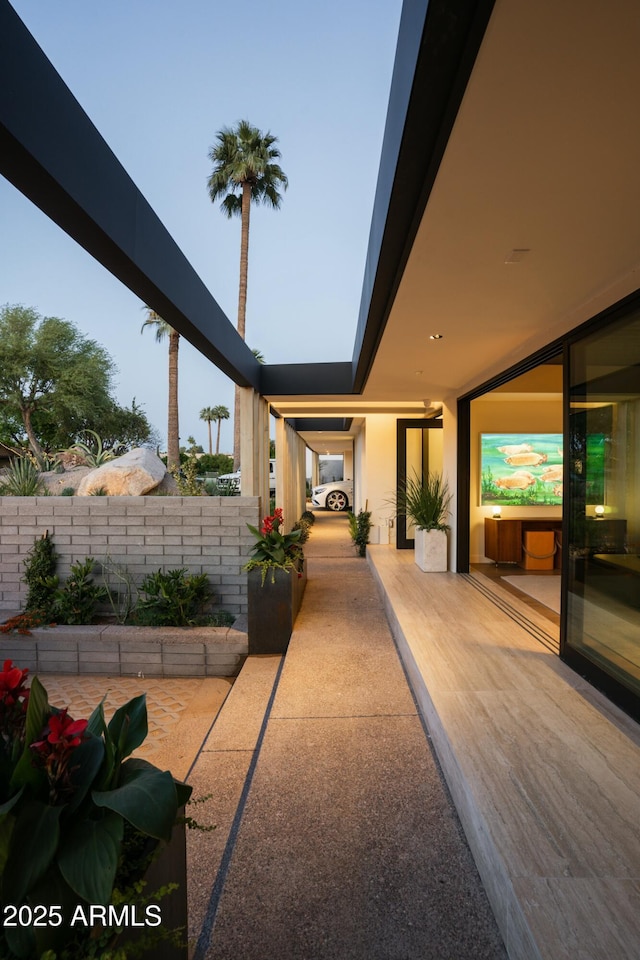 view of patio / terrace featuring fence