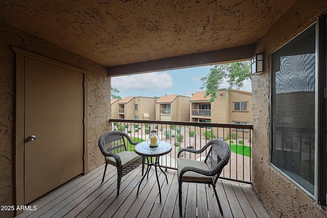 balcony featuring a residential view