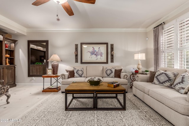 living room featuring crown molding and ceiling fan