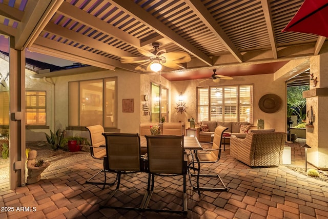 view of patio with an outdoor living space, ceiling fan, and a pergola