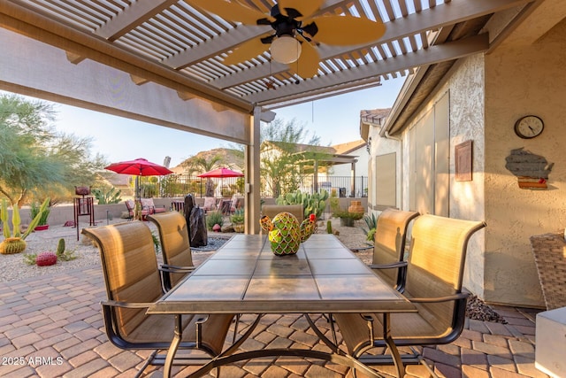 view of patio with a pergola and ceiling fan