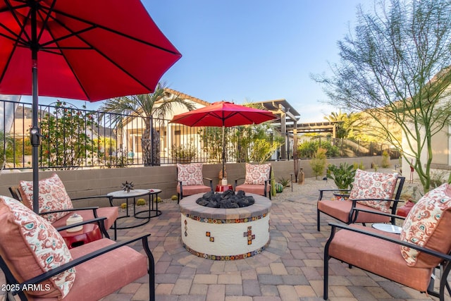 view of patio featuring an outdoor fire pit