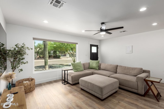 8547 E Roanoke Ave, Scottsdale, AZ 85257 - living room featuring recessed lighting, visible vents, light wood finished floors, and a ceiling fan