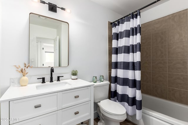 8547 E Roanoke Ave, Scottsdale, AZ 85257 - bathroom with toilet, vanity, and shower / bath combo with shower curtain