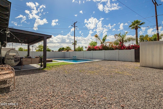 8547 E Roanoke Ave, Scottsdale, AZ 85257 - view of yard featuring a patio area, a fenced backyard, and a fenced in pool