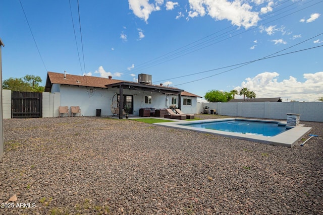 8547 E Roanoke Ave, Scottsdale, AZ 85257 - view of pool with a fenced in pool, a fenced backyard, a gate, central air condition unit, and an outdoor living space
