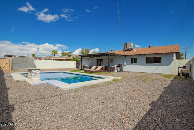8547 E Roanoke Ave, Scottsdale, AZ 85257 - view of swimming pool featuring central air condition unit, a fenced in pool, a patio area, and a fenced backyard