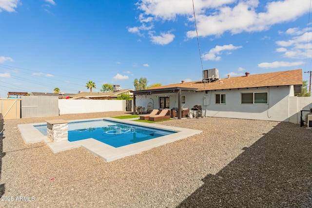 8547 E Roanoke Ave, Scottsdale, AZ 85257 - view of pool featuring a fenced backyard, central AC unit, a patio area, and a fenced in pool