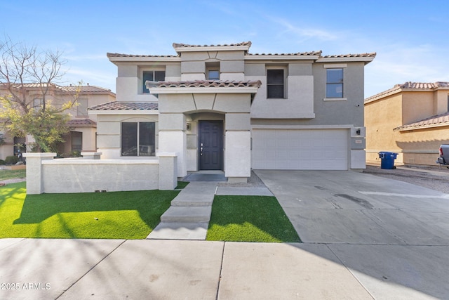 mediterranean / spanish-style home with a garage