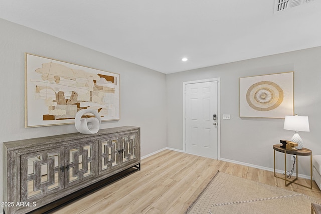 foyer entrance featuring hardwood / wood-style flooring