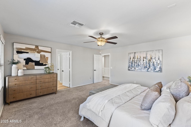 bedroom with light carpet and ceiling fan