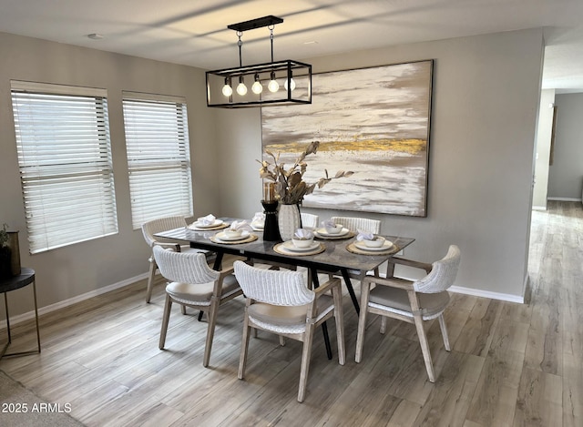 dining room featuring light wood-type flooring