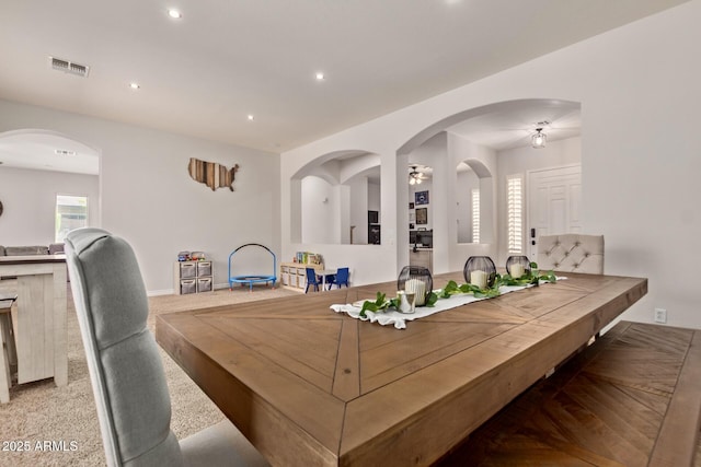 dining space with recessed lighting and baseboards
