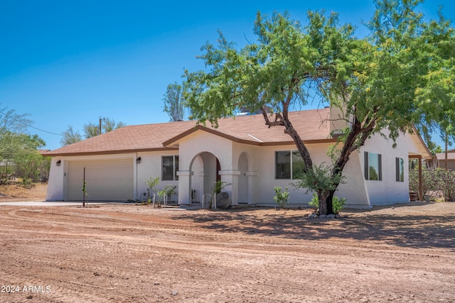 view of front of home with a garage