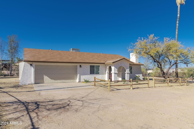 view of front of property featuring a garage