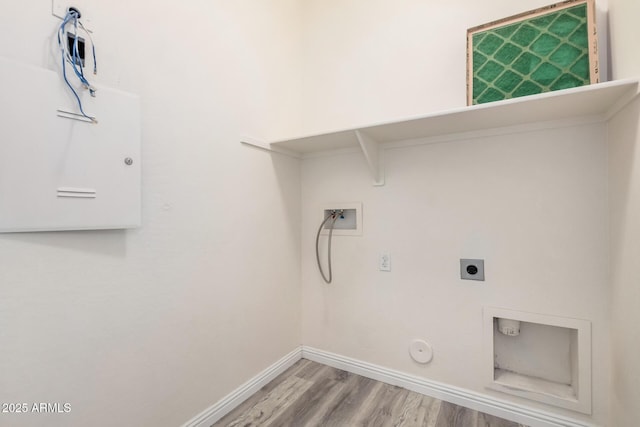 laundry room with wood finished floors, baseboards, gas dryer hookup, laundry area, and washer hookup