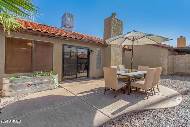 2154 E Forge Ave, Mesa, AZ 85204 - view of patio / terrace with outdoor dining area and central AC unit