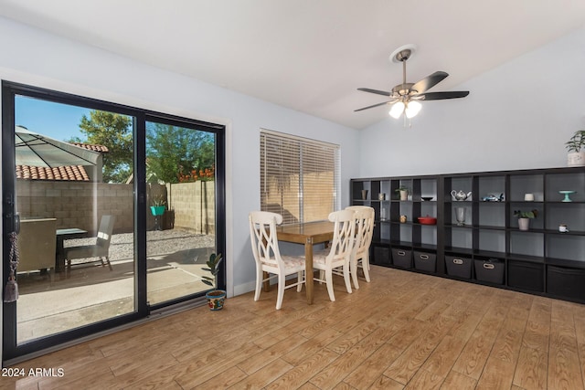 2154 E Forge Ave, Mesa, AZ 85204 - dining room with wood finished floors, a ceiling fan, and vaulted ceiling