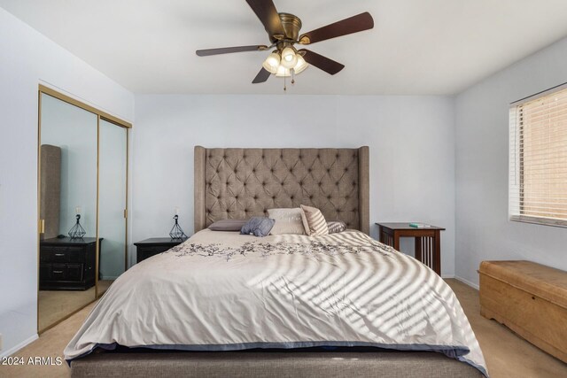 2154 E Forge Ave, Mesa, AZ 85204 - bedroom with light carpet, a closet, a ceiling fan, and baseboards