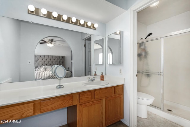 2154 E Forge Ave, Mesa, AZ 85204 - full bathroom with ensuite bath, a stall shower, a ceiling fan, and toilet