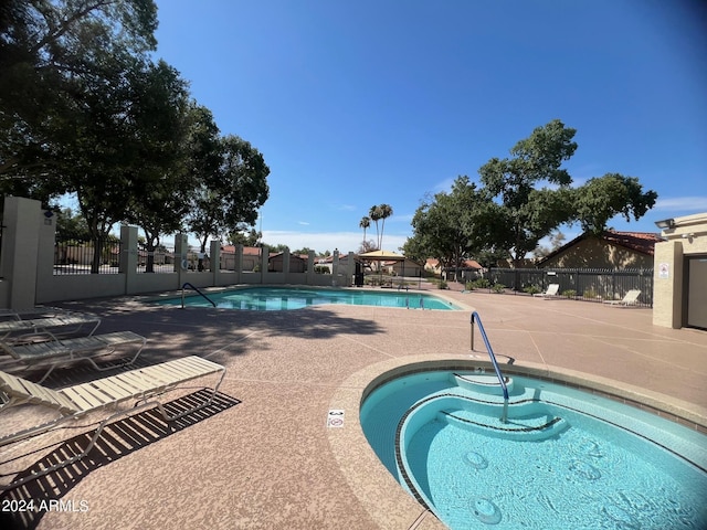 2154 E Forge Ave, Mesa, AZ 85204 - community pool with a hot tub and a patio